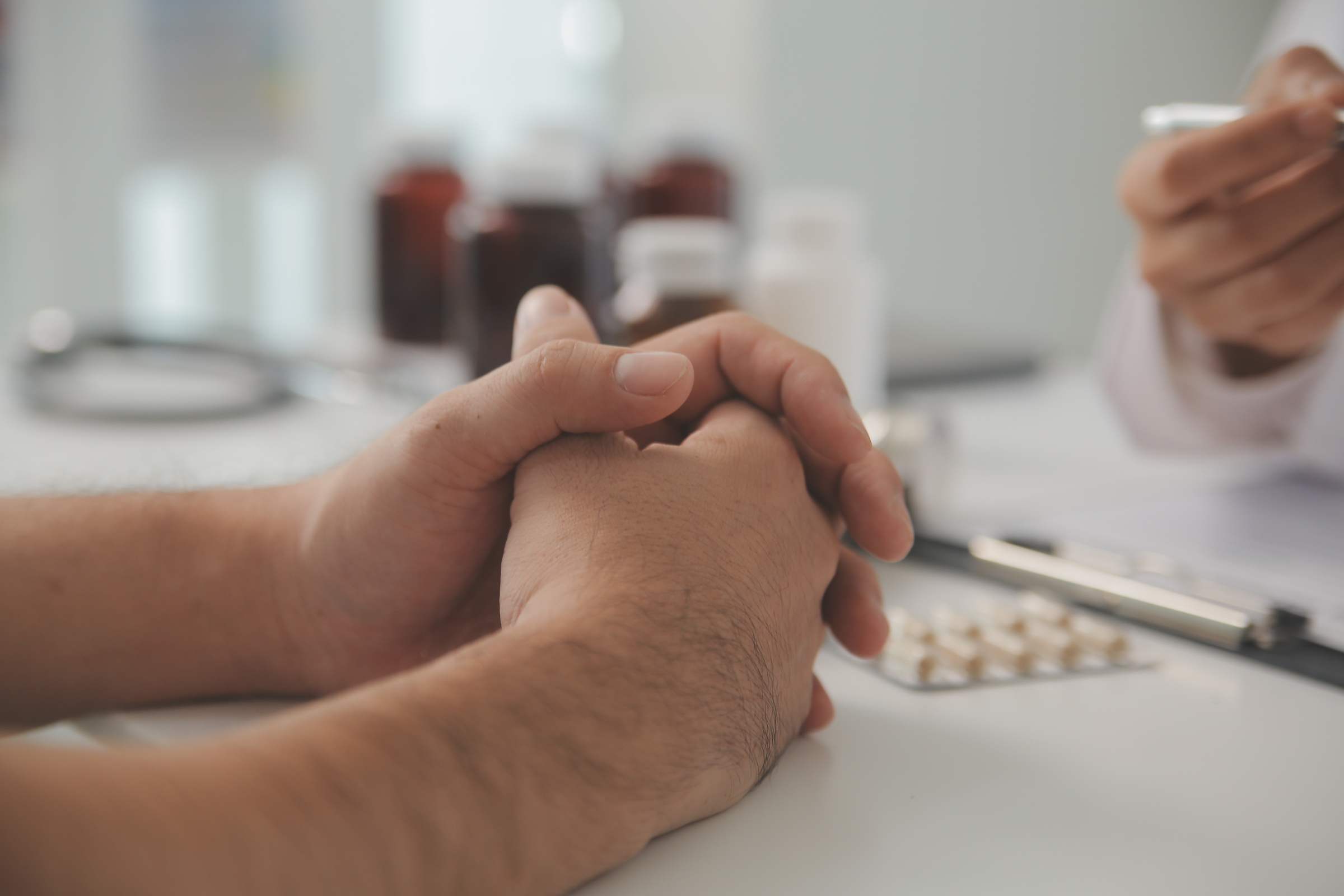 Professional therapist working with client